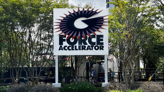 A sign for the G-Force Accelerator welcomes guests