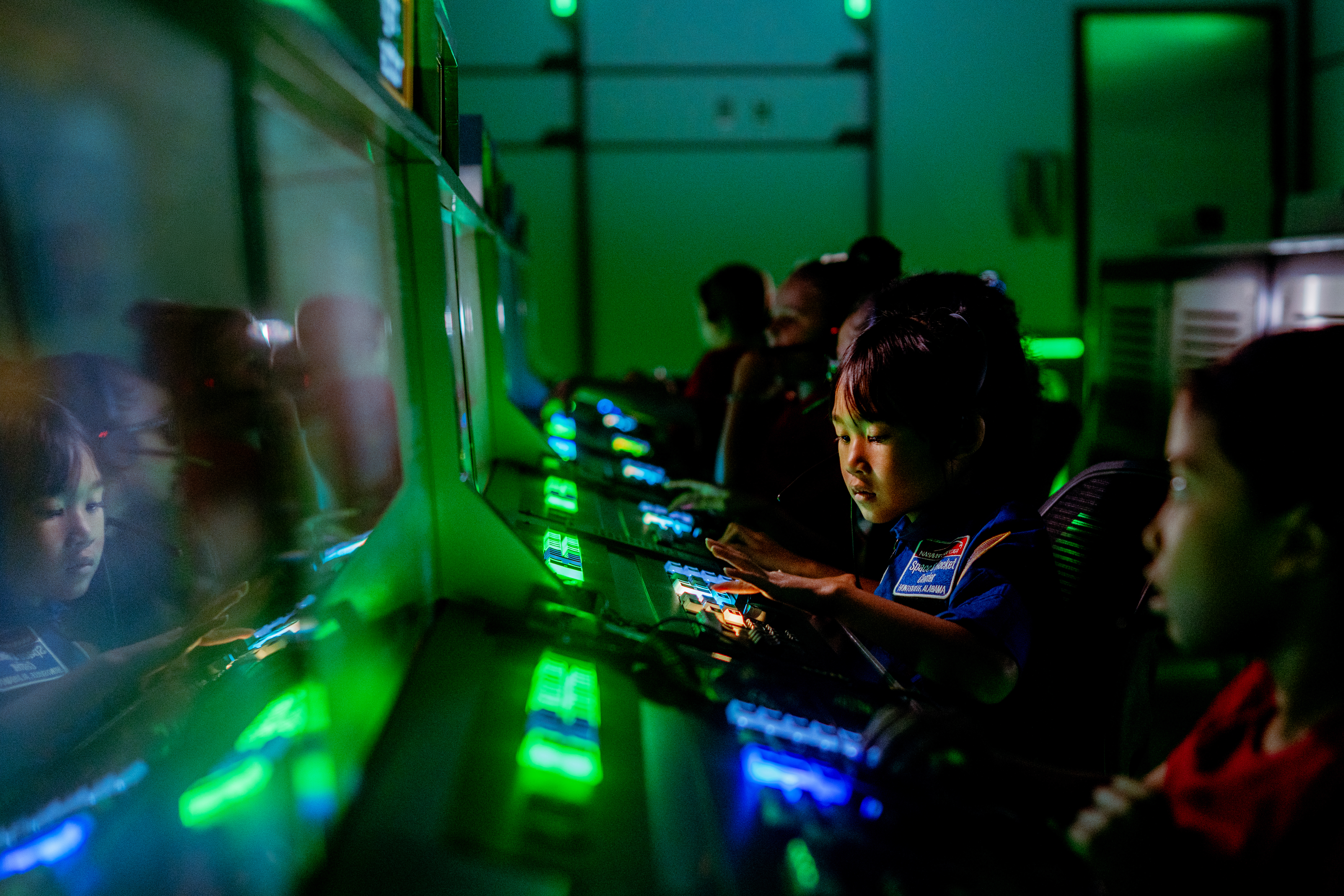 Kids having fun learning in Mission Control in the new I4 building